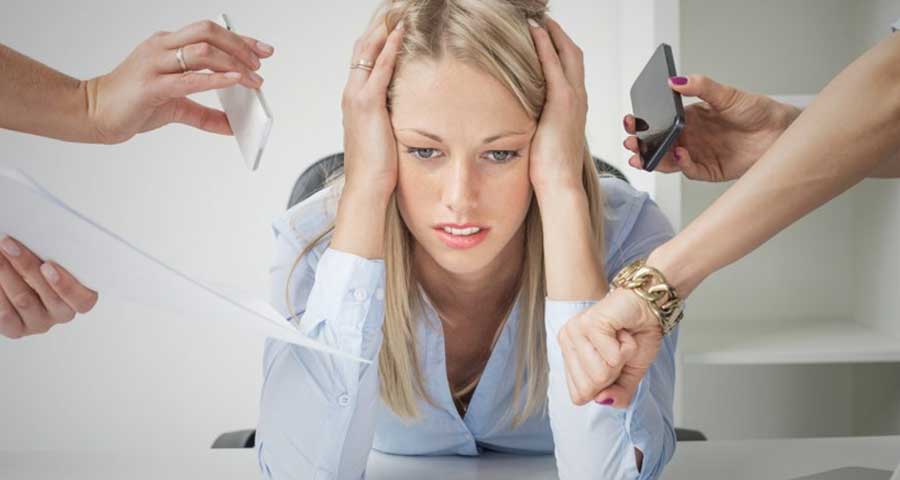 woman at work who is under stress