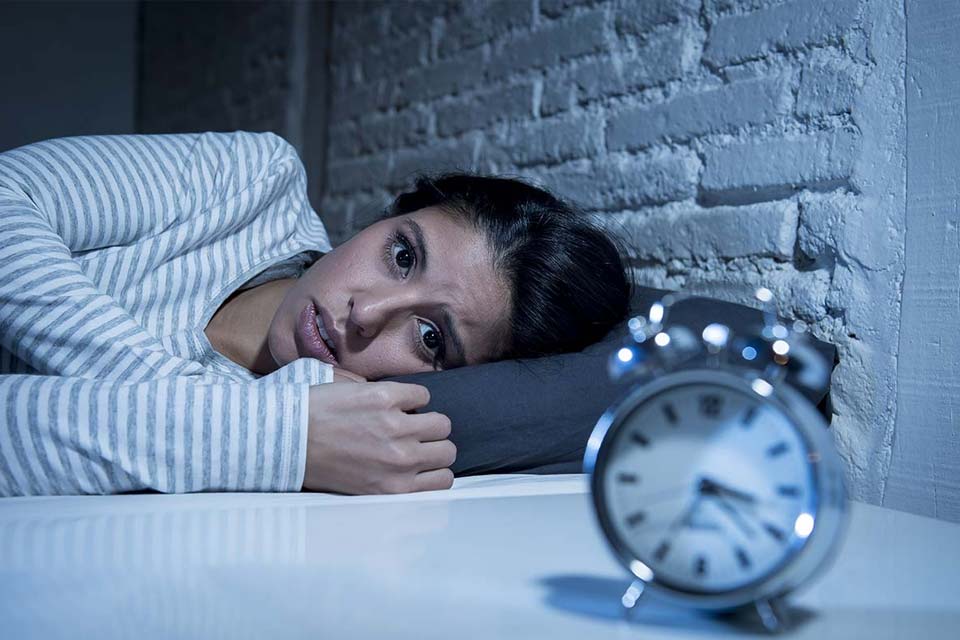 woman who is fighting insomnia