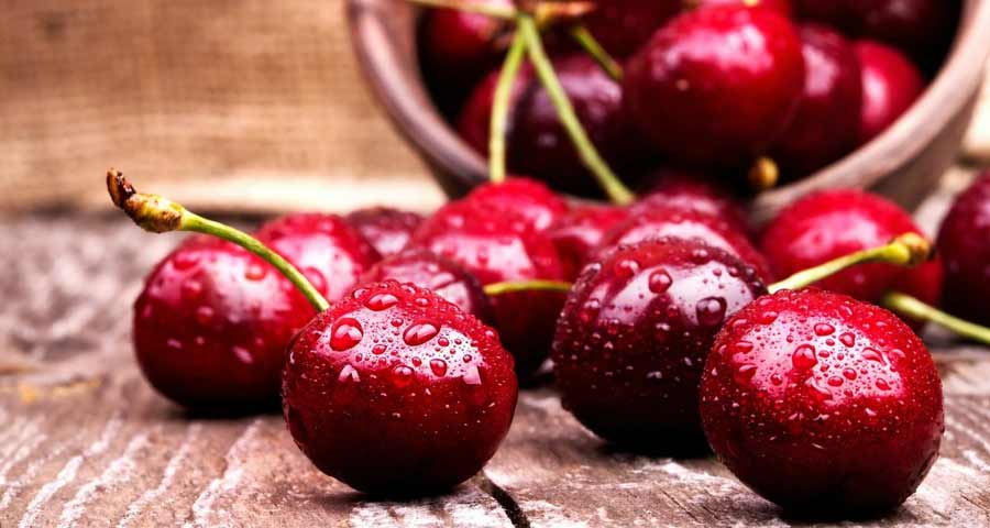 Cherries on a wooden table